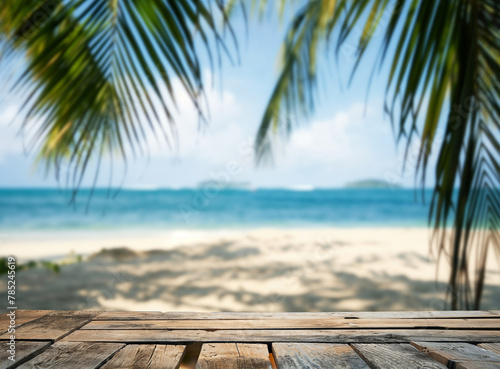 Empty wooden planks table with blur beach and sea background  product placement