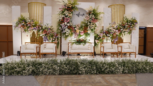a photo of a beautiful bright wedding stage indonesian