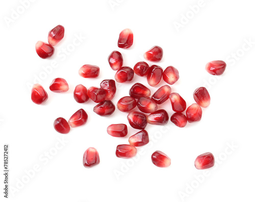 Ripe juicy pomegranate grains isolated on white, top view
