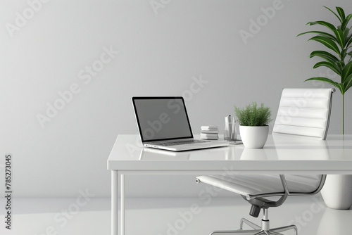 Laptop on white table in a modern office
