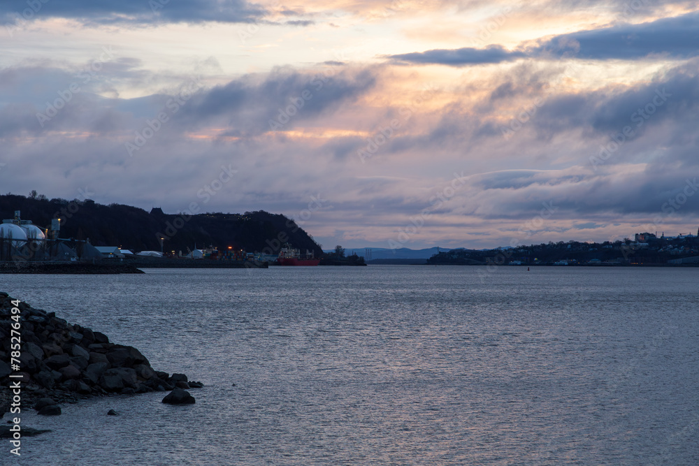 Blue hour cloudy sunrise view of the St. Lawrence River in the Anse-au-Foulon sector, Quebec City, Quebec, Canada
