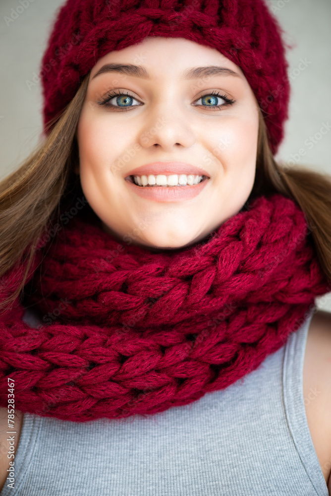 portrait of beautiful young girl in warm knitted scarf portrait of beautiful young girl in warm knitted scarf