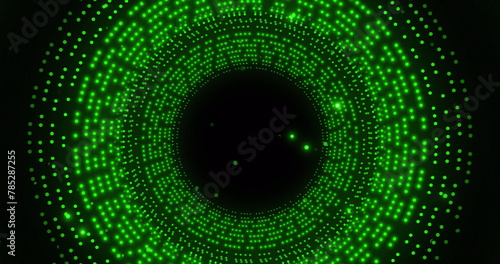 Image of spinning green glowing circles on black background