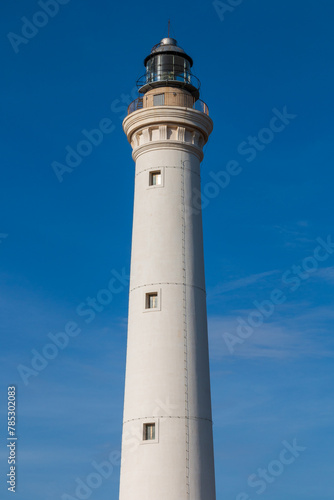 A white lighthouse in a sunny day. © Daniele