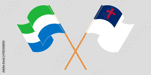 Crossed and waving flags of Sierra Leone and christianity photo