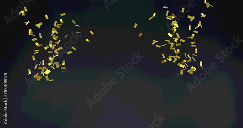 Image of gold confetti floating over black background