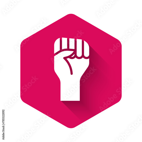 White Raised hand with clenched fist icon isolated with long shadow. Protester raised fist at a political demonstration. Empowerment. Pink hexagon button. Vector