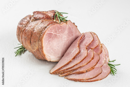 Delicious ham. artisanal whole smoked slab bacon on a cutting block on a wooden board, top view