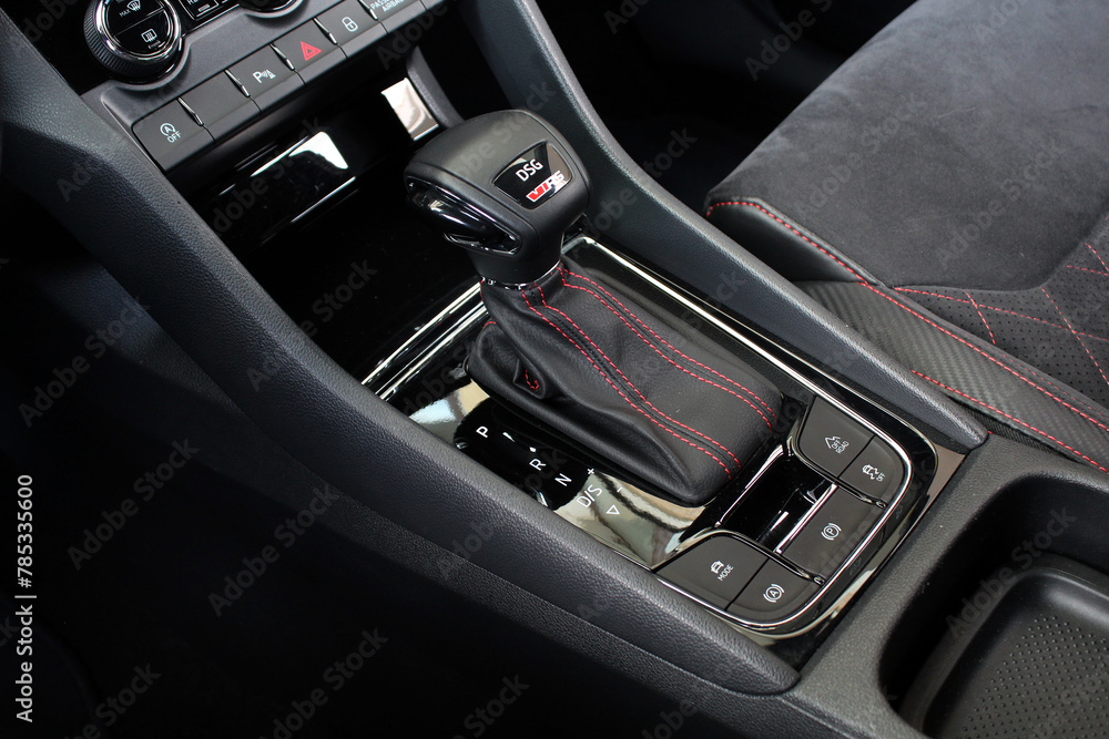 Vinnytsia, Ukraine; April 13, 2024. Modern Automatic Transmission in Car. Gear lever close up. Direct-shift gearbox. DSG automatic transmission. Multiple-shaft, automatic gearbox.
