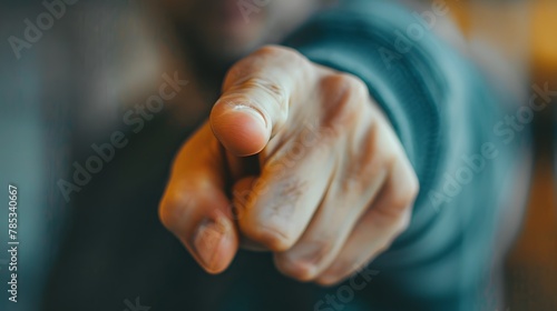 close-up of an unknown person s hand pointing. Concept  guilt  success