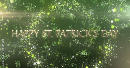 Image of st patrick's day text and green shamrock on green background photo