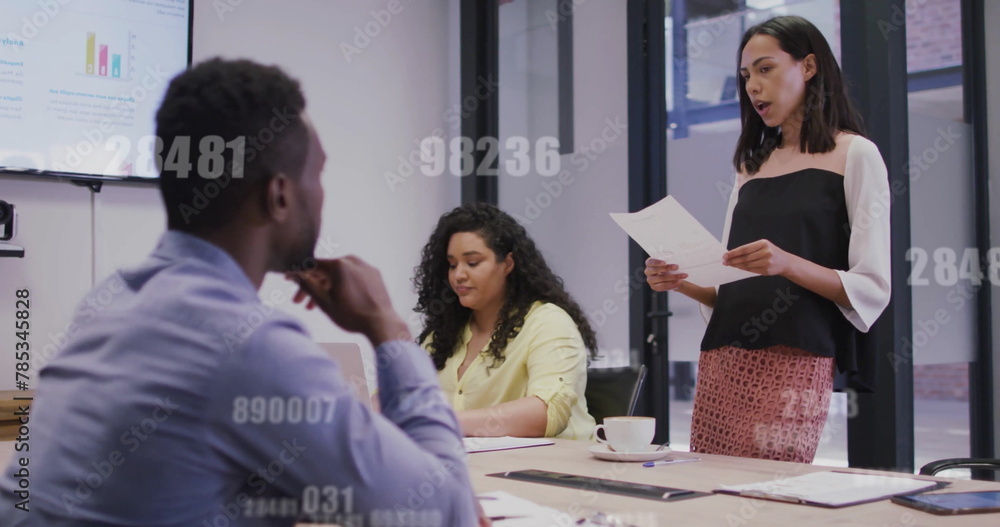 Naklejka premium Image of data processing over diverse business people in office