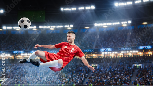Aesthetic Shot Of Athletic Caucasian Soccer Football Player Doing Beautiful Overhead Kick On Stadium With Crowd Cheering. International Championship Final Match on Big Arena Full Of Loyal Fans. © Gorodenkoff