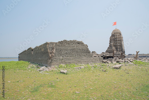 Palasnath Temple. It is normaly submerged underwater. During Drought like condition it become accessible. Temple is located in the backwater of Ujjani Dam. Palasdev, Pune, Maharashtra, India. photo