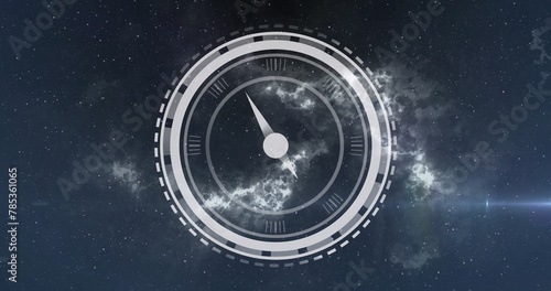 Image of clock moving over stars on black background