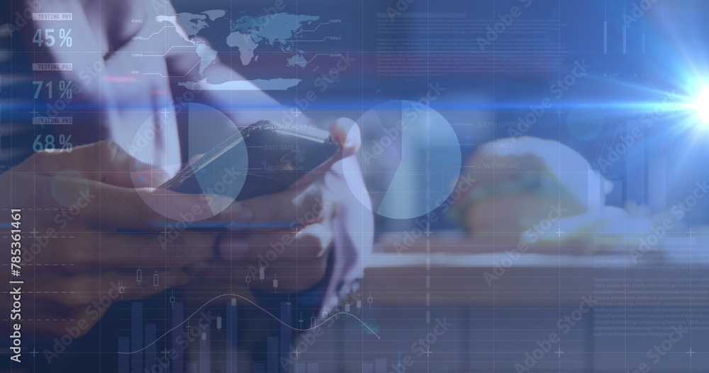 Fototapeta premium Image of graphs over hands of caucasian man using smartphone