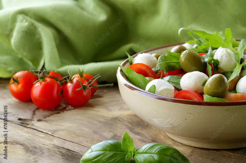 mozzarella cheese for salad with tomatoes and basil