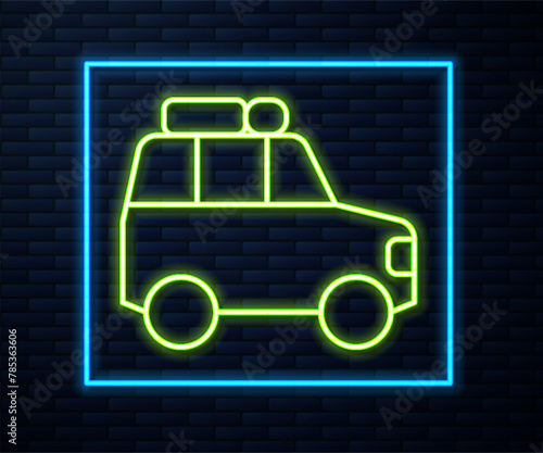 Glowing neon line Car icon isolated on brick wall background. Vector