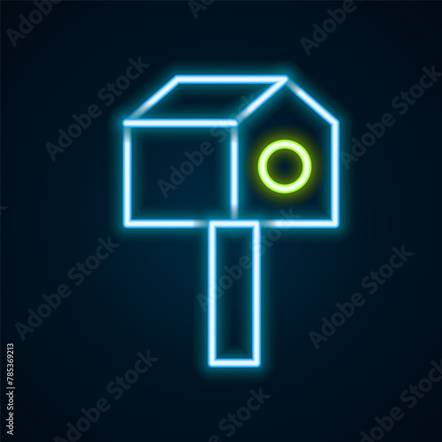 Glowing neon line Bird house icon isolated on black background. Nesting box birdhouse, homemade building for birds. Colorful outline concept. Vector