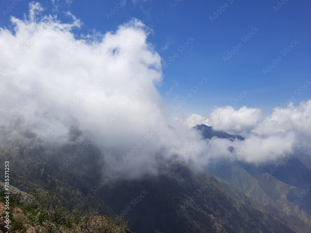 Mesmerizing natural beauty of Abha in Saudi Arabia in the summer season. High mountains, greenery, low clouds and fog are the beauty of Abha.