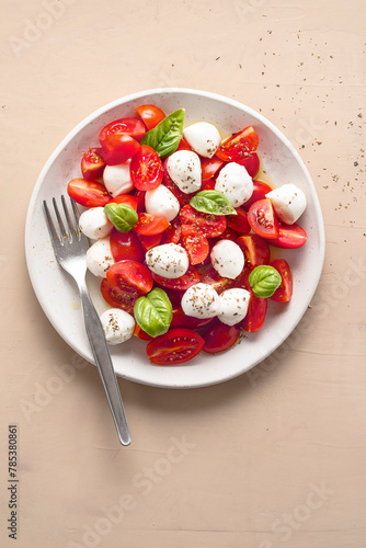 Italian food. Salad of small mozzarella and cherry tomatoes.