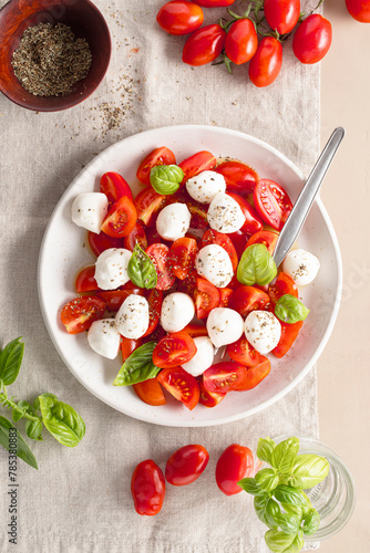Italian food. Salad of small mozzarella and cherry tomatoes.