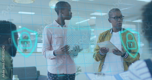 Image of fingerprint over african american business people in office photo