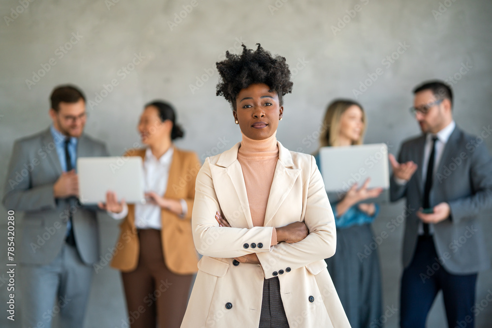 Portrait of successful group of business people at office. Multiethnic group of people smiling. Portrait of successful group of business people at office. Multiethnic group of people smiling.