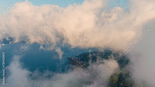 Istanbul, Turkey. The bridge of Sultan Selim Yavuz across the Bosphorus. Flight in the clouds. Sunset time., Aerial View