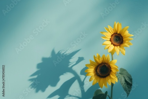 Flower Wall Paper. Pair of Sunflowers on Light Blue Abstract Background