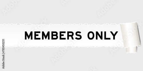 Ripped gray paper background that have word members only under torn part