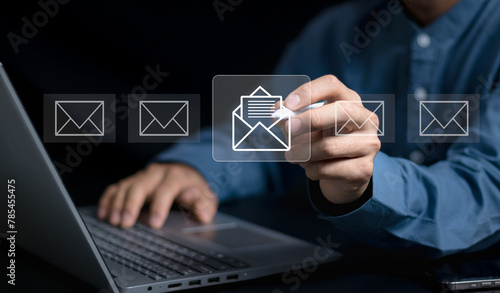 Businessman receives email notification, New email notification concept. business email communication and digital marketing, newsletter, message, sms, electronic communication technology.. photo