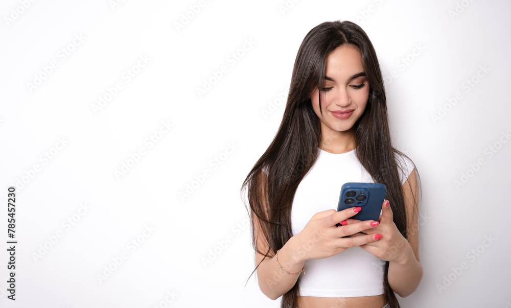 Young woman with phone on white background Young woman with phone on white background