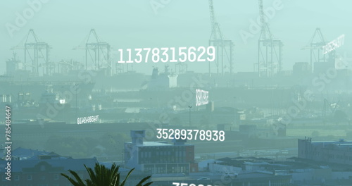Image of changing numbers and computer language over fog covered modern city