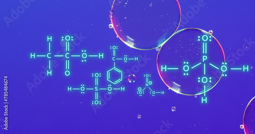 Image of chemical formula over bubbles on blue background