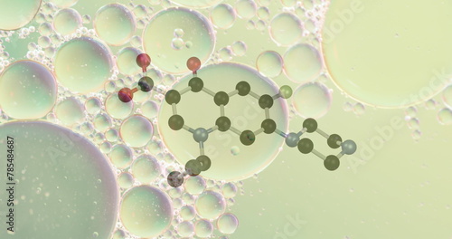Image of chemical model over bubbles on green background