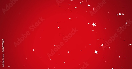 Image of illuminated stars flying against red background