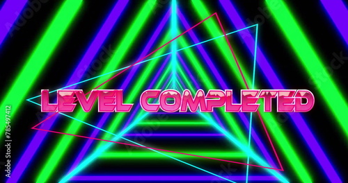 Image of level completed text over neon pattern