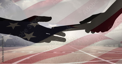 Composite image of american flag over silhouette of hand passing a baton against sports track