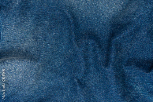 Blue jeans denim texture as a background. Top view.