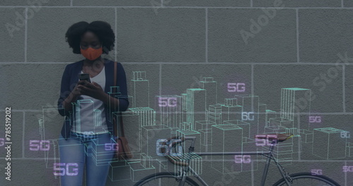 Image of graphical rotating skyscrapers and 5g text over african american woman using cellphone