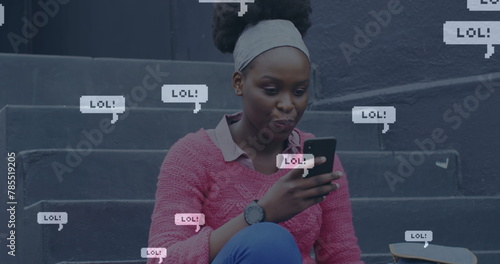 Image of social media notifications and lol message over african american woman using cellphone
