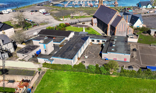 Aerial view of Seaview Primary School in the Beautiful Glenarm Village County Antrim Northern Ireland photo