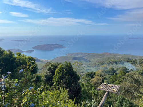 landscape of beach and mountains.  

Landscape from the mountains of the Altos de Sucre, Venezuela, view of the Caribbean Sea
