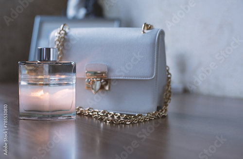 Women's accessories. Perfume and handbag