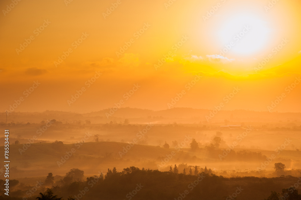 Spectacular landscape with sunrise scene in Pak Chong, famous attraction in Nakhon Ratchasima Province, Northeast of Thailand Spectacular landscape with sunrise scene in Pak Chong, famous attraction in Nakhon Ratchasima Province, Northeast of Thailand