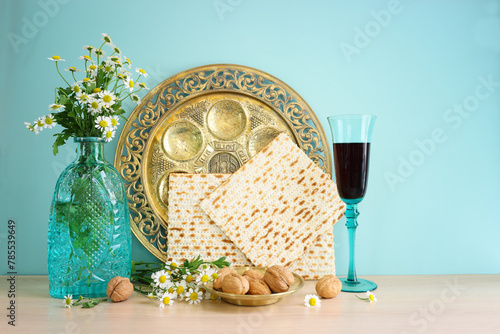 Pesah celebration concept (jewish Passover holiday). Translation of Traditional pesakh plate text: Passover, shankbone, bitter hearb, sweet date