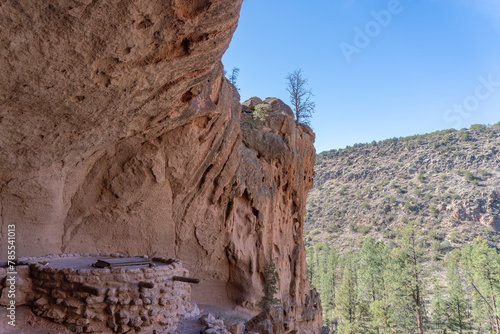 Alcove House at Bandelier National Monument preserves Ancestral Puebloan home in New Mexico. Ceremonial Cave with kiva above Frijoles Canyon. photo