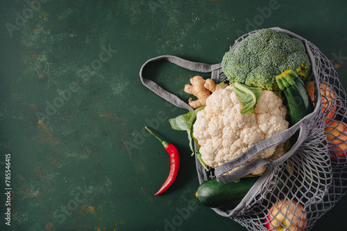 fruits vegetables in reusable mesh cotton bag, plastic free zero waste concept