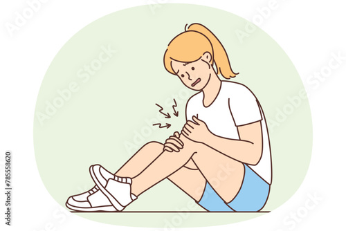 Unhealthy girl with knee pain